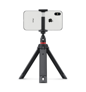 Back view of JOBY tripod with adjustable mounting bracket holding iPhone in landscape orientation.