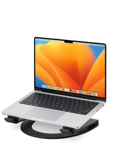 The Curve Flex Stand, in lowest position, with open MacBook on top of it. 