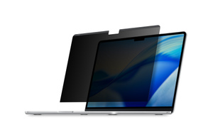 Kensington UltraThin Magnetic Privacy Screen, above open MacBook Air, about to be applied to screen