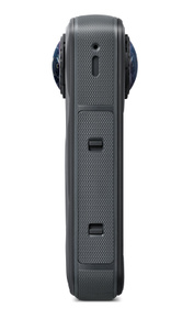 Insta360 camera, side exterior, microphone at top, battery release latches at center