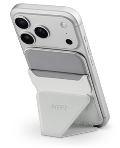 Moft MagSafe Wallet Stand, back exterior, grey colour, iPhone attached, stand folded out to support it in portrait mode