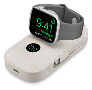 Belkin 10K BoostCharge Pro Power Bank, top exterior, beige color, rounded corners, LED power indicator at top, text reads: 100, Apple Watch charging, integrated USB-C cable at side, power button below it, USB-C charge port at bottom