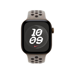 巷陌灰色 Nike 运动表带 (外侧为浅灰色，贴近皮肤的一侧为深灰色，带有精致的不规则形状图案)，展示带气孔的橡胶材质。