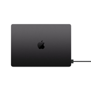 USB-C to MagSafe 3 cable, Space Black woven design with color matched magnetic MagSafe connector, connected to closed Space Black MacBook Pro.