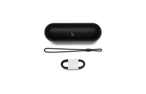 Beats Pill Bluetooth® Speaker in Champagne Gold with the matching high-strength carry lanyard attached for ultimate portability. 