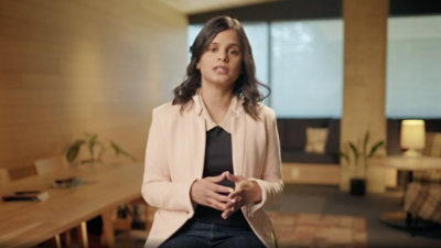 A woman with long, wavy hair, with the name "Shilpa Bothra"