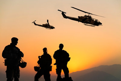Image of a flying plane and sunset