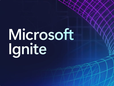 蓝紫相间的背景上以白色显示“ Microsoft Ignite”字样。
