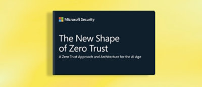 A close-up of a black rectangular sign with white text displaying Microsoft Security The New Shape of Zero Trust A Zero Trust Approach and Architecture for the AI Age.