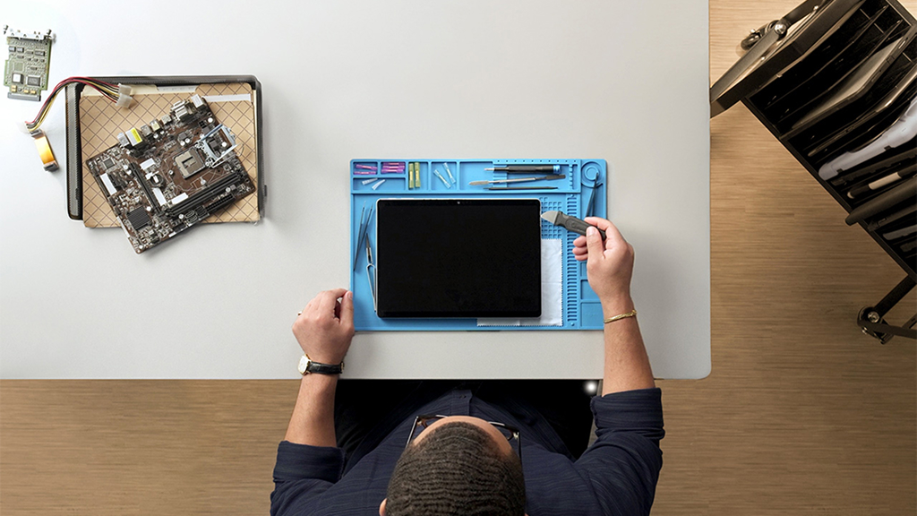 Man working on his device